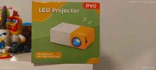 Mini proyector LED blanco y amarillo
