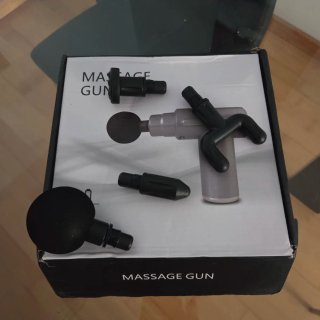 Pistola de masaje