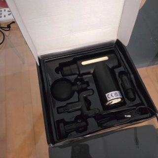 Pistola de masaje