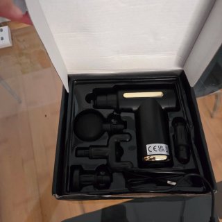 Pistola de masaje