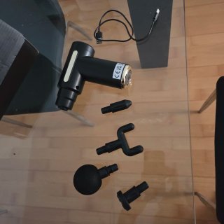 Pistola de masaje