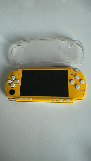 PSP Amarilla versión Los Simpson+ 7 UMDs + Funda