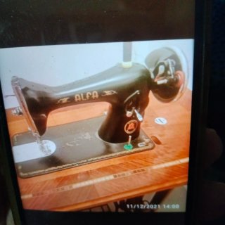 Máquina de coser Alfa