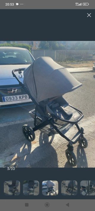 Carro de bebé gris