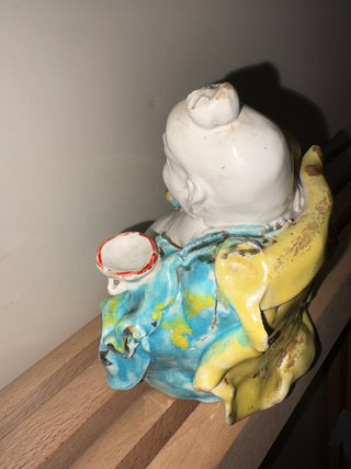 Antico Buddha in ceramica