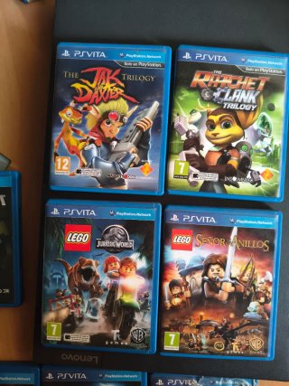 PS Vita con caja original 10 juegos ,más funda