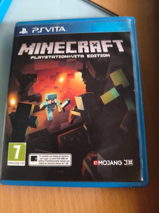 PS Vita con caja original 10 juegos ,más funda