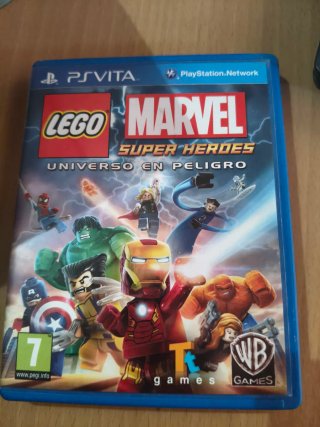 PS Vita con caja original 10 juegos ,más funda