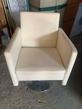 Sillón de peluquería giratorio