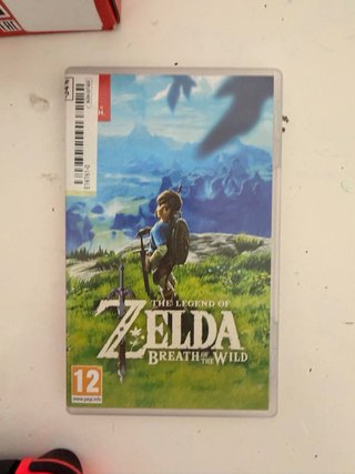 Nintendo Switch + Zelda Breath of the Wild + howar