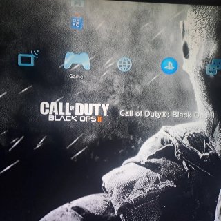 Playstation 3 con 2 mandos y juego