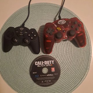 Playstation 3 con 2 mandos y juego