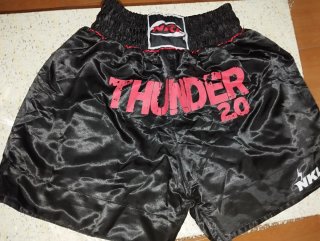 Pantalones Muay Thai Adidas y NKL
