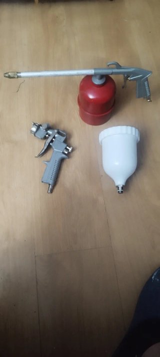 Pistola de pintar con depósito