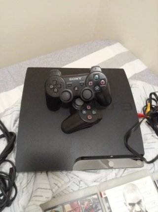Consola PlayStation 3 + 5 juegos