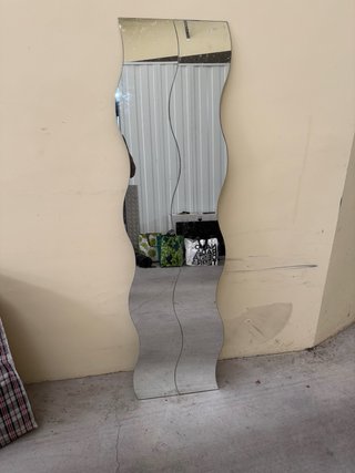 Espejos ondulados plateados