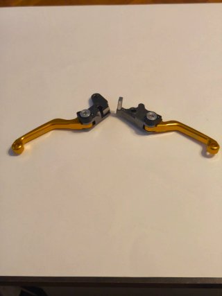 Manetas de Freno Moto Doradas y Grises