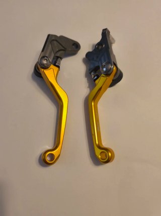 Manetas de Freno Moto Doradas y Grises