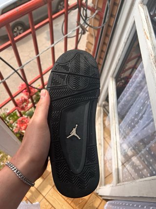 Jordan 4 Negro