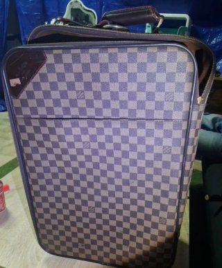 Maleta Louis Vuitton Marrón y Dorada