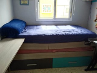 Cama nido de tela blanca