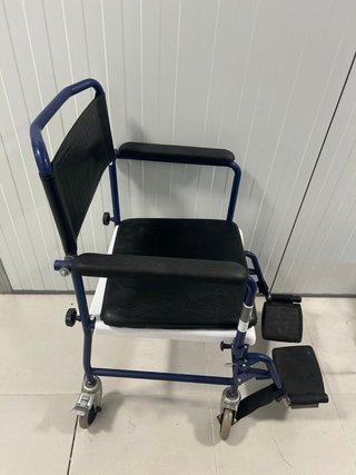 Silla minusválidos de baño
