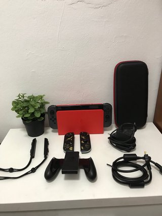 IMPECABLE!! Nintendo Switch OLED + accesorios