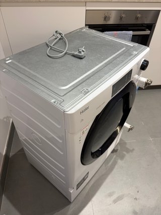 Secadora integrable Haier 7kg, Condensación, Bomba