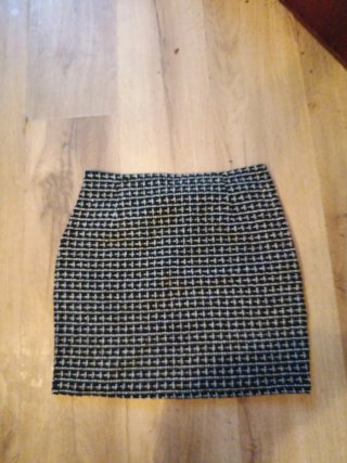 Falda tweed botones dorados