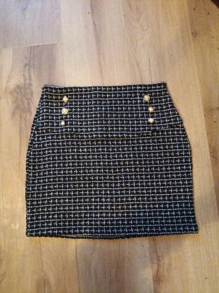 Falda tweed botones dorados