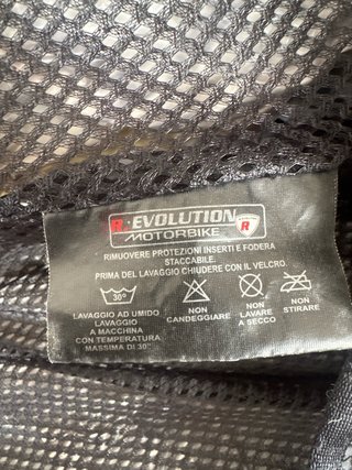 Chaqueta de moto azul y negra revolution R