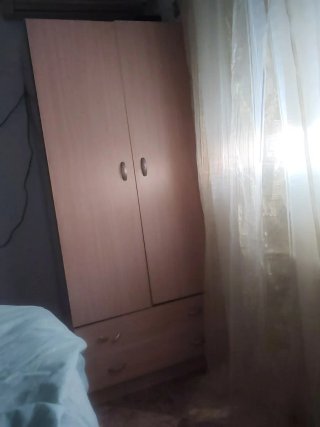 Armario beige de madera