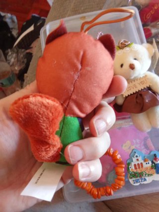 Lote 5 peluches y pulsera naranja