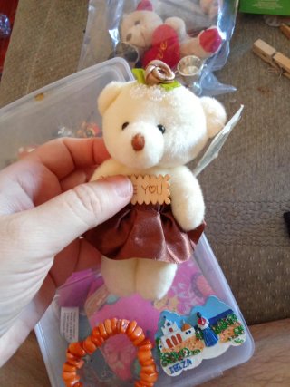 Lote 5 peluches y pulsera naranja