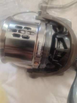 Molinete de pesca roto - pieza reemplazable