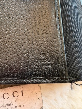 Portafoglio Gucci nero con logo