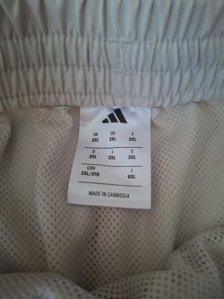 Pantalón corto Adidas beige