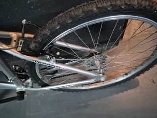 Bicicleta Romester plateada y rosa