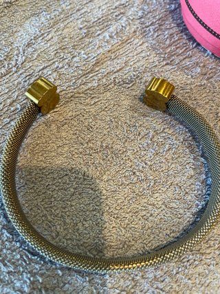 Pulsera Tous malla dorada y plateada