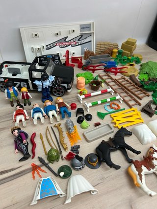Lote de piezas y muñecos playmobil