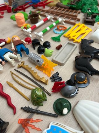 Lote de piezas y muñecos playmobil