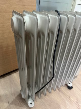 Radiador eléctrico beige en buen estado