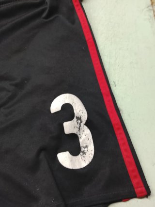 Pantaloncini Milan Adidas neri con bande rosse