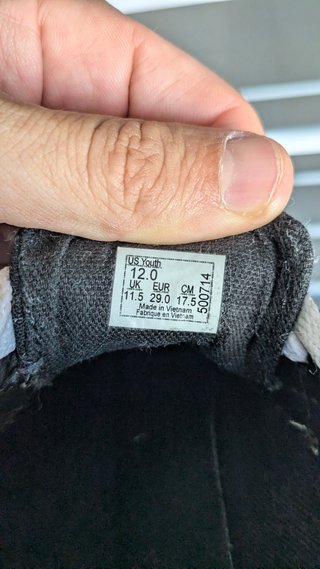 Zapatillas Vans niño negras y blancas