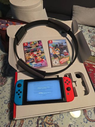 Nintendo Switch + Mario Kart + Ring Fit