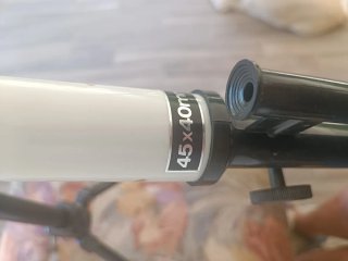 Telescopio de juguete con trípode