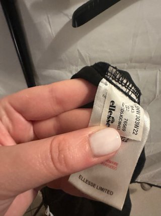 Pantaloni tuta neri con banda laterale