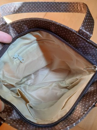 Bolso de mano con flores beige y marrón