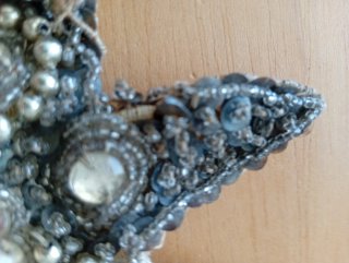 Estrella decorativa con pedrería antigua