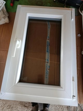 Ventana de pvc,blanca  y imitación madera